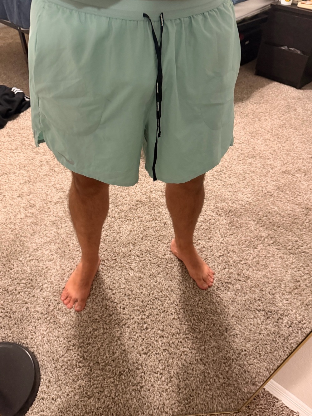 Nike Men's Mint Green Athletic Shorts with Black Drawstring